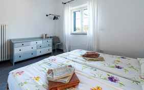 Das Schlafzimmer im Casa Carlo mit Doppelbett. 